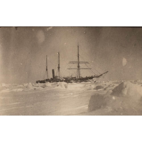 72 - A group of three photographs of an ice locked Terra Nova:, together with a postcard of the Terra Nov... 