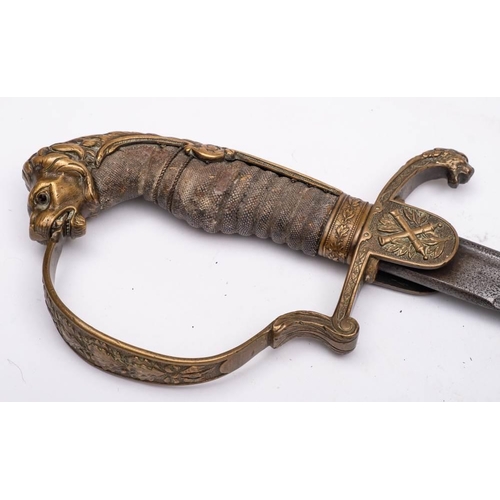 241 - An Imperial German, officers sword: with 77cm etched blade, brass knuckle guard, with fishskin and w... 