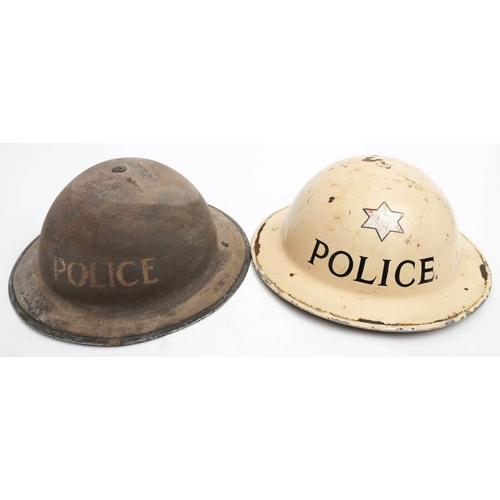 273 - A WWII Police Inspectors MK.II steel helmet: white with painted 'Police' and rank star, together wit... 