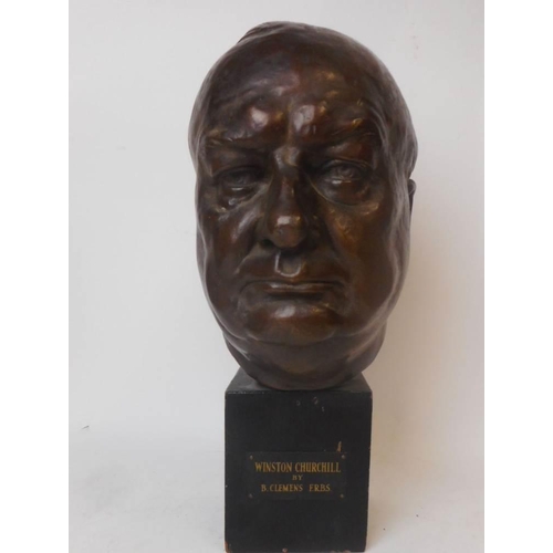 283 - After B Clemens F.R.B.S. a bronzed copper bust of Winston Churchill: mounted on a wood base, overall... 