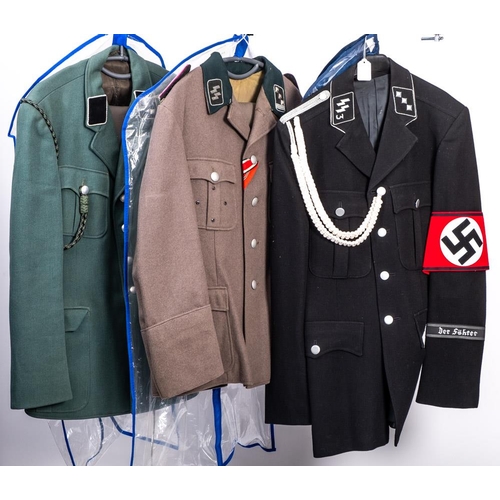 325 - A group of seven reproduction German military unifoms: