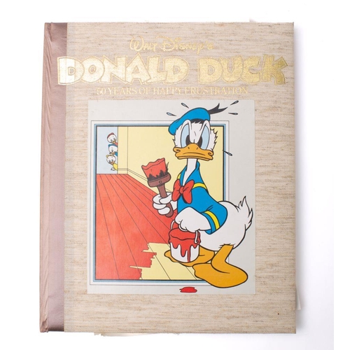 53 - WALT DISNEY'S Donald Duck 50 Years of Happy Frustration : illustrated throughout, 4to, org. linen ba... 