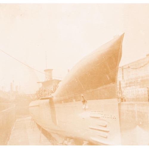 162 - An early 20th century photograph album of Royal Navy submarines: including  E41, E51, E47, C2, K5 an... 