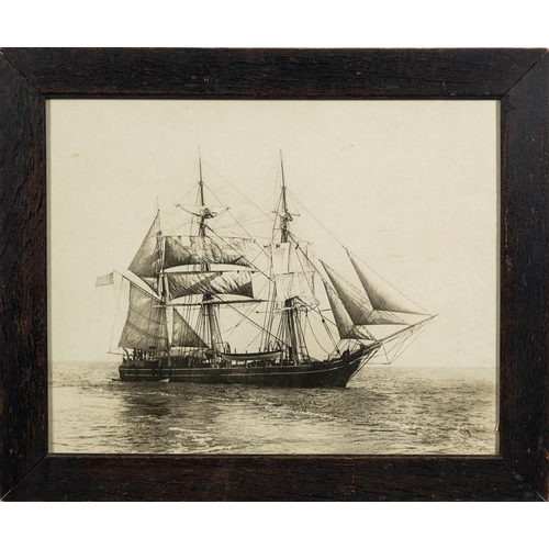 168 - Two late 19th/ early 20th century photographs of HMS Surprise: one with white ensigns as an Admiralt... 