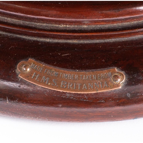 214 - A mahogany Lazy Susan constructed from timber taken from  HMS Britannia: the circular top with mould... 