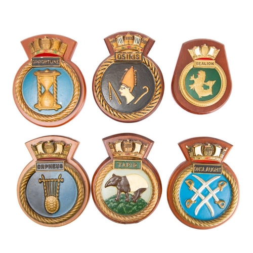 229B - A group of nine plaster and composition Royal Navy wardroom badges: including HMS 'Astute', HMS 'Sea... 