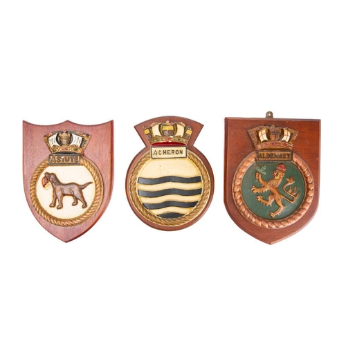 229B - A group of nine plaster and composition Royal Navy wardroom badges: including HMS 'Astute', HMS 'Sea... 