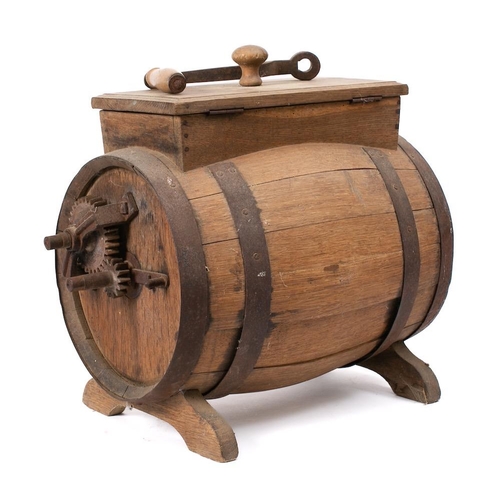 12 - A coopered butter churn: with iron mechanism and detachable handle, having a hinged lid and interior... 