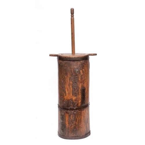 16 - A 19th Century iron bound cylindrical butter churn: with twin-handled cover and plunger, 95cm overal... 