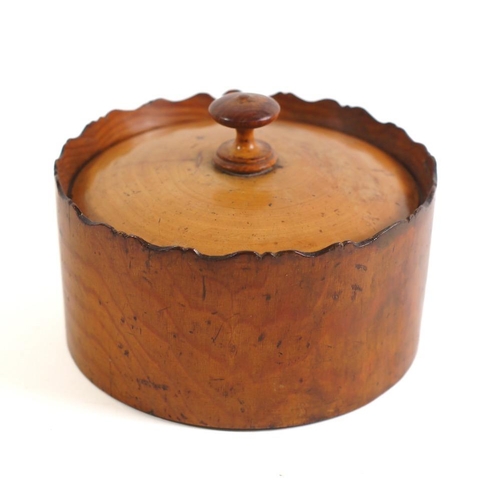 196 - A 19th Century sycamore circular spice box and detachable cover:, the interior with eight drum-shape... 