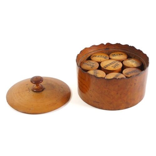 196 - A 19th Century sycamore circular spice box and detachable cover:, the interior with eight drum-shape... 