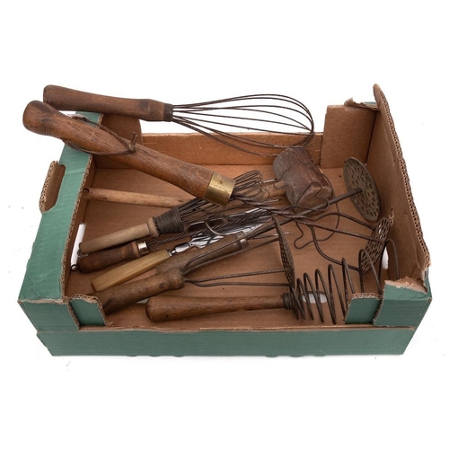 224 - A collection of whisks, potato mashers, sieves, milk and cream scoops: and sundry kitchen bygones, c... 