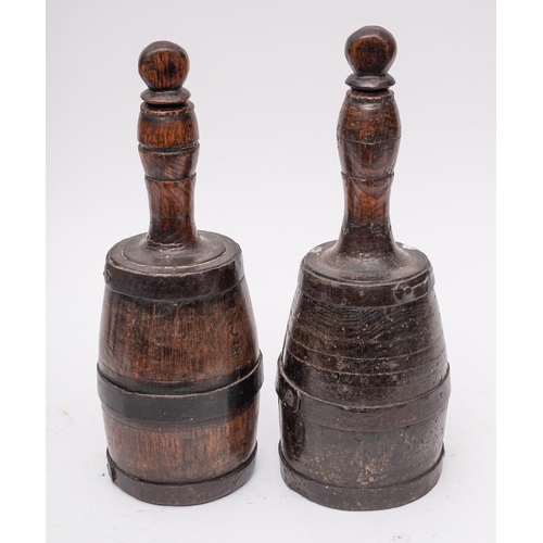 266 - Two 19th Century iron bound wood decanters: of mallet shape, with stoppers, 35cm and 36cm high.