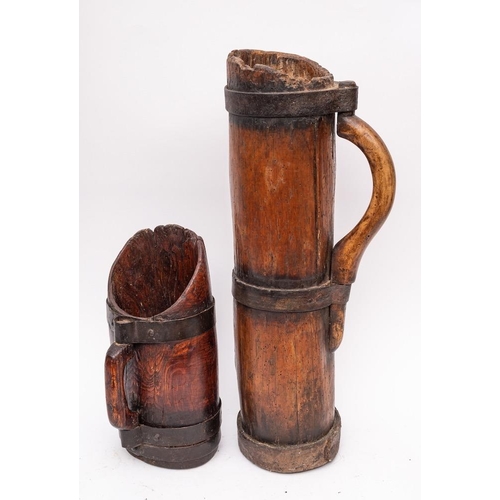 268 - A Pyrenean Cresse belle iron coopered jug:, 56cm high and a smaller jug or scoop, 31.5cm high. (2)