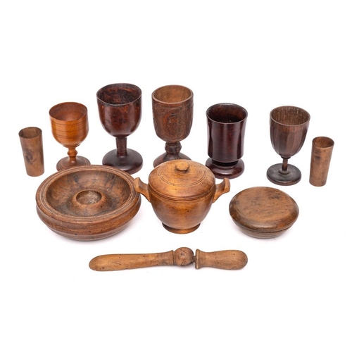 285 - Five various treen goblets:, a small fruitwood circular twin-handled bowl and cover, a circular shal... 