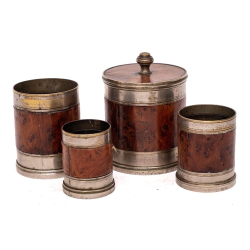 288 - A graduated set of four burr yew-wood and metal mounted measures: with cover, 5.5cm - 8cm high.