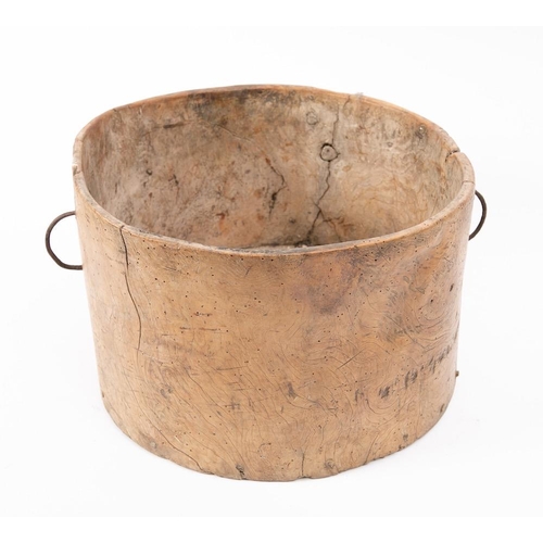 299 - A rare West Country wooden dug out bucket: with iron loop twin handles, 39cm diameter, 18th/19th Cen... 