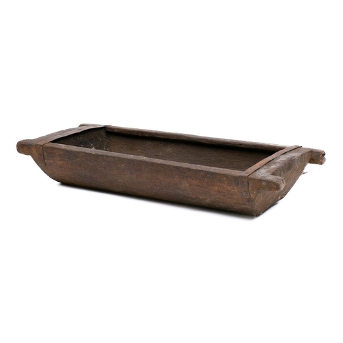 315 - A rectangular adzed wood salting trough: with central draining hole, 87 x 37.5cm.