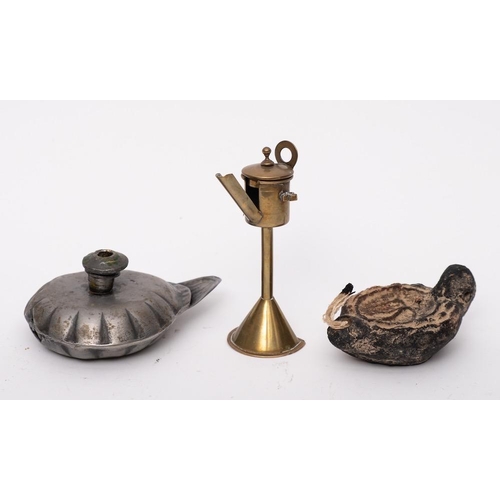 327 - A miniature Dutch brass oil lamp: on cone-shaped base, 12cm high, a pewter oil lamp of Romanesque fo... 