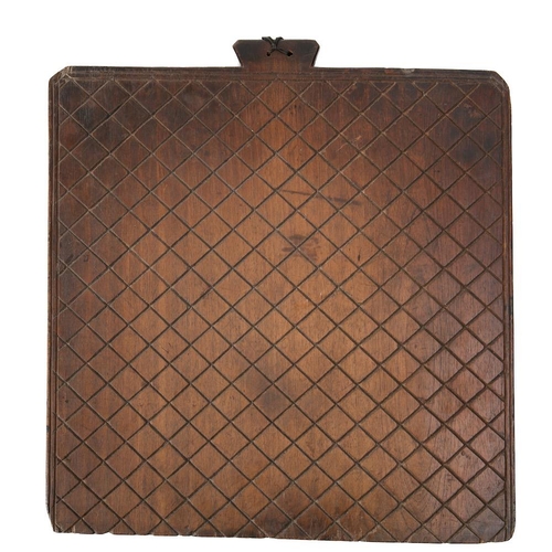 33 - A 19th Century Scottish oat hanging board: with incised lattice design, 49.5 x 46.5cm.