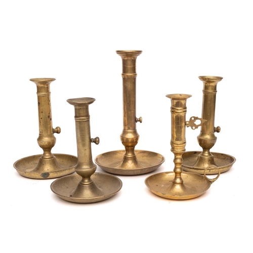 342 - Five 19th Century brass ejector candlesticks: with saucer bases.