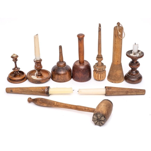 350 - Five wooden candlesticks: of various designs, two wood mallets, wood funnel, a roller, an 18th Centu... 