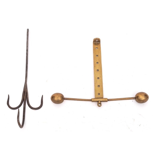 376 - A brass and iron adjustable meat hook: having triple iron spikes on an adjustable brass bar with bal... 