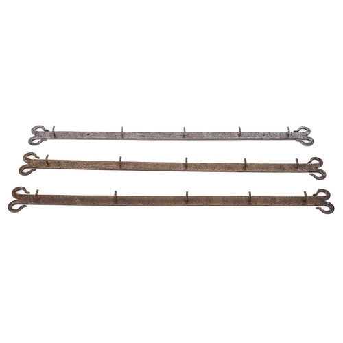 416 - Three steel bar type hook racks: with scroll ends and damascened decoration, each with five hooks, 8... 