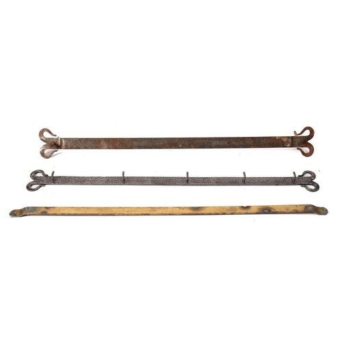 417 - A steel bar type hook rack: with scroll ends and damascened decoration, having five hooks, 87.5cm lo... 