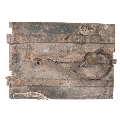 44 - A 19th Century cast iron and brass bread oven door:, banded hinges and scrollwork above brass knop h... 