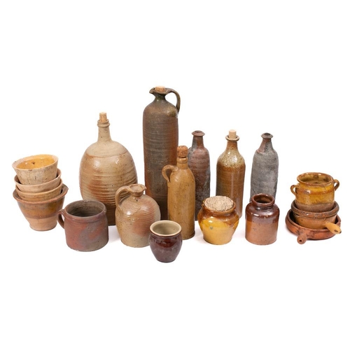 498 - A mixed group of kitchen ceramics:, comprising stoneware bottles and ewers, a comfit pot, two single... 