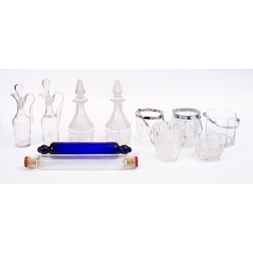 500 - A small group of glass:, comprising an oil and vinegar bottle, pair of decanters, four ice buckets a... 