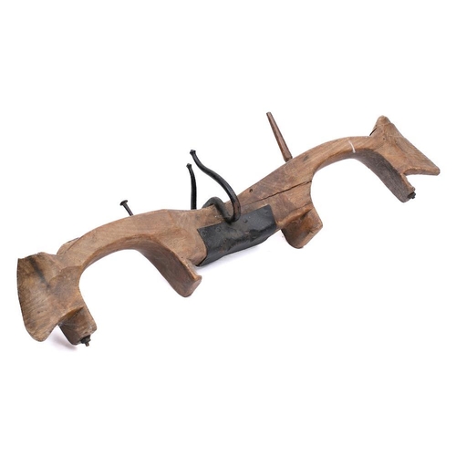 8 - A 19th Century fruitwood and iron mounted yoke:, 122cm long.