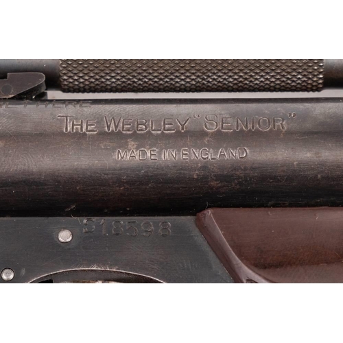 100 - A Webley Senior .22 calibre air pistol: serial number 'S18598' with brown Bakelite two piece grips.