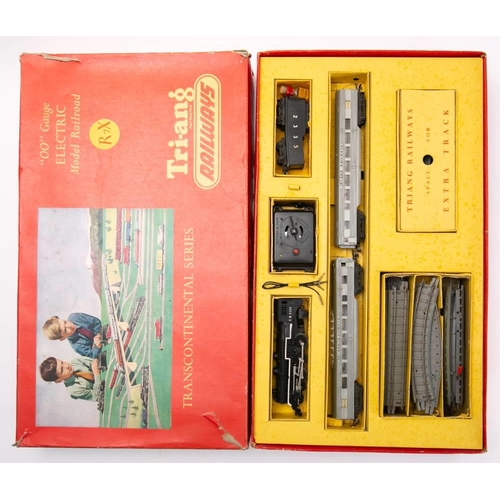 1023 - Tri-ang railway OO/HO gauge. A boxed collection of  locomotives, rolling stock and accessories: incl... 