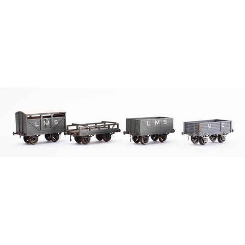 1027A - Milbro O gauge. A group of four goods wagons: comprising MB003 Cattle wagon, two open wagons and a L... 