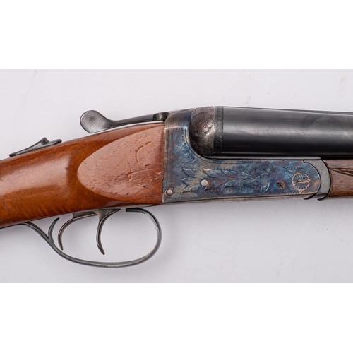 130 - An AYA  12 bore side by side boxlock ejector shotgun: No. 26956, 28 inch barrel, chased action, doub... 