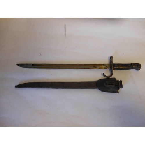 185 - Japanese 30th Year type bayonet: with 40cm fullered blade, wood grips contained in a steel scabbard.