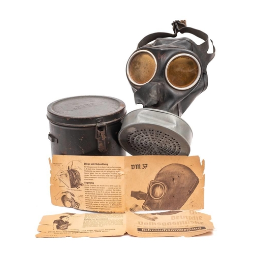 221 - A WWII German RL 1  gas mask:  the filter stamped with eagle and swastika emblem and numbered '0541'... 