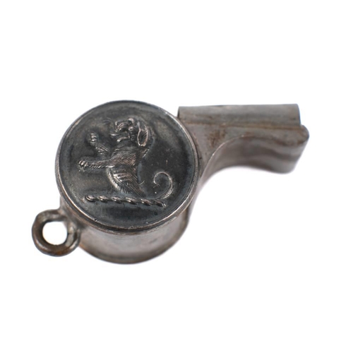 259 - A small whitemetal  fob whistle :together with a small Acme pattern whistle with dog armorial and tw... 