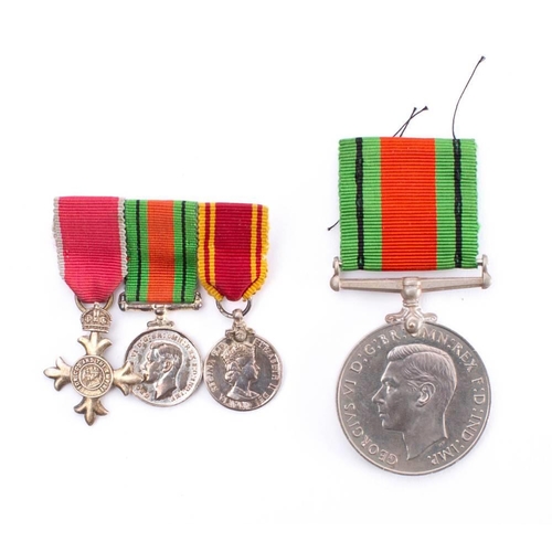 280 - An O.B.E. miniature group of three medals: includes O.B.E Civil, Defence Medal and Fire Brigade Long... 