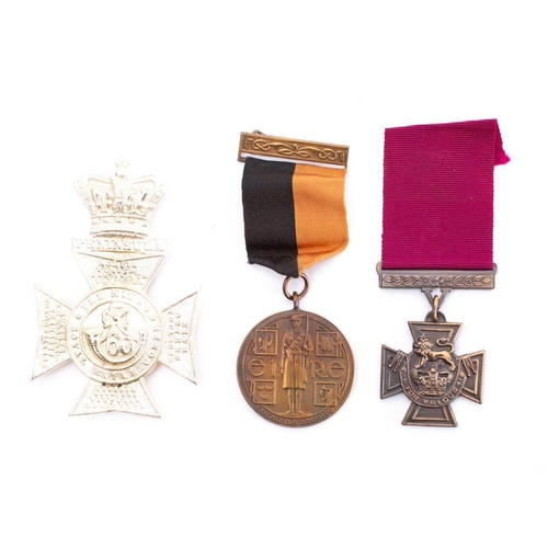 283 - A replica  Victoria Cross: a replica Eire General Service Medal and a replica The Kings Royal Rifle ... 