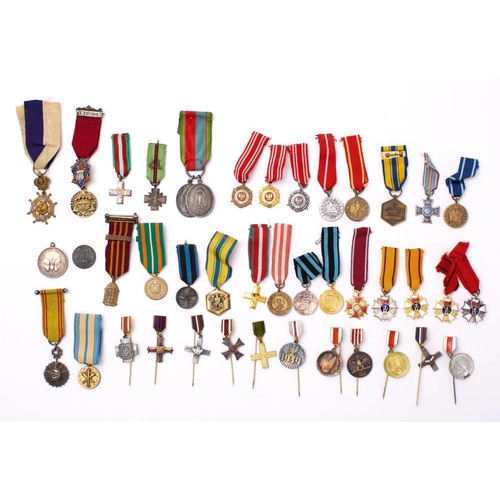 287 - A collection of various miniature world orders and medals: including a Tunisian Order of Nichan Ifti... 