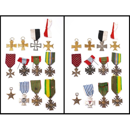 297 - Three WWI Croix de Guerre, together with a WWII Croix de Guerre and one other, also a group of vario... 