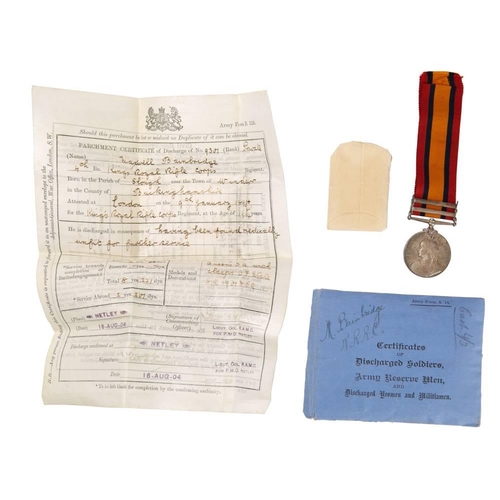 317 - A Queen's South Africa medal with two clasps '9301 Pte  M Bainbridge KRRC', together with velum disc... 