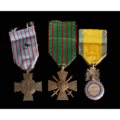 345 - A WWI French Croix du Combattant, a Criox du Guerre and a Medaile Militaire (3):