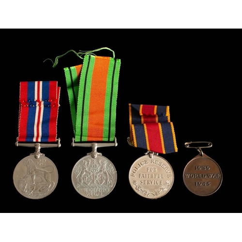 357 - A Rhodesian Police Reserve Long Service Medal '5325M F/R H Von Memerty': together with a 1939-1945 W... 