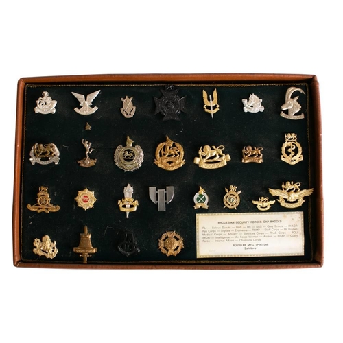 358 - A collection of British and Commonwealth Regimental badges and buttons: including a 1st South Africa... 