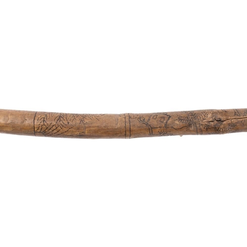 369 - A WWII German Afrikra Korps POW walking cane: the natural root shaft hand decorated with eagle and s... 