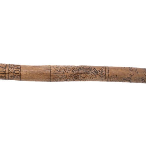 369 - A WWII German Afrikra Korps POW walking cane: the natural root shaft hand decorated with eagle and s... 